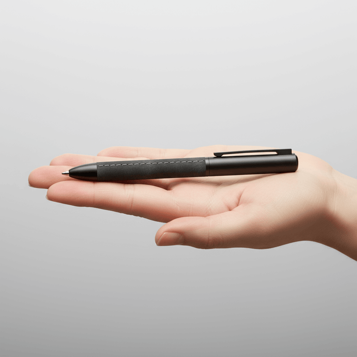 Sengetti Cowskine Ball Pen held in hand, showcasing its stylish matte black design from the Andy Cartwright Collection.