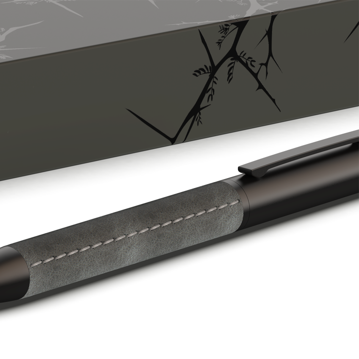 Sengetti Cowskine Ball Pen with stitched leatherette grip and matte black brass barrel, featured in stylish packaging.