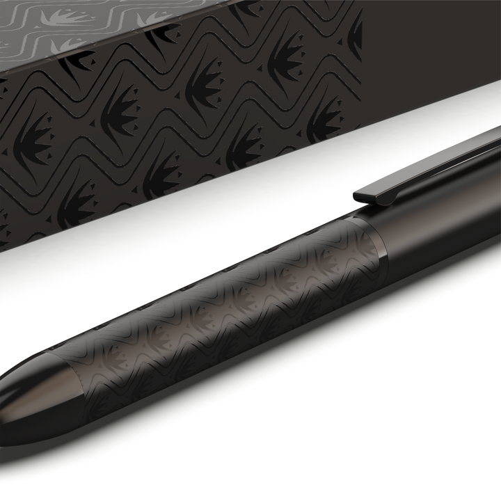 Sengetti Protea Signature Ball Pen resting beside its decorative box featuring a black patterned design.